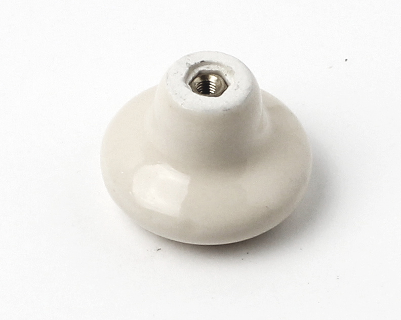 81035 - knopka 38mm porc.slon. kost/zlatý ornament