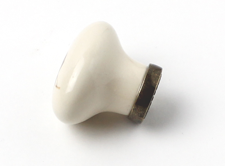 91056 - Knopka porcelánová 25x34